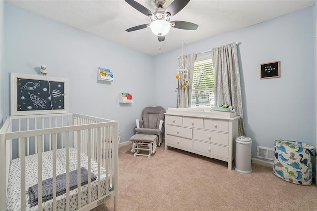 190 Windflower Trce, Roswell, GA 30075 - bedroom featuring light carpet, a nursery area, and a ceiling fan