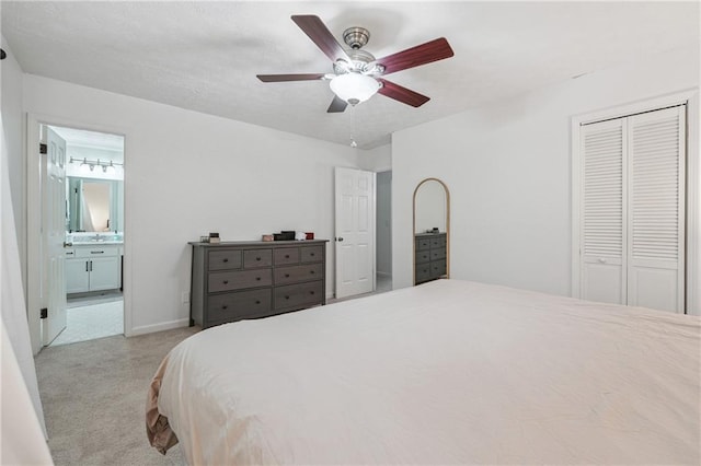 190 Windflower Trce, Roswell, GA 30075 - bedroom with light carpet, a closet, connected bathroom, and a ceiling fan