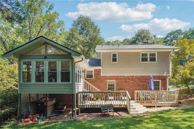 190 Windflower Trce, Roswell, GA 30075 - rear view of property with a deck, brick siding, and a lawn