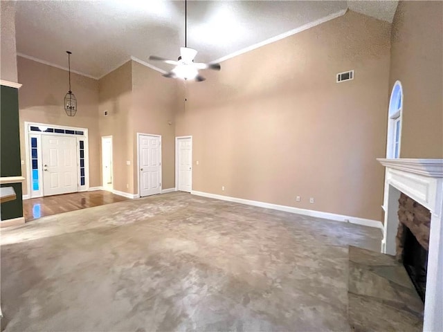 6745 Fairfield Trce, Suwanee, GA 30024 - unfurnished living room with high vaulted ceiling, carpet floors, crown molding, a fireplace with raised hearth, and baseboards
