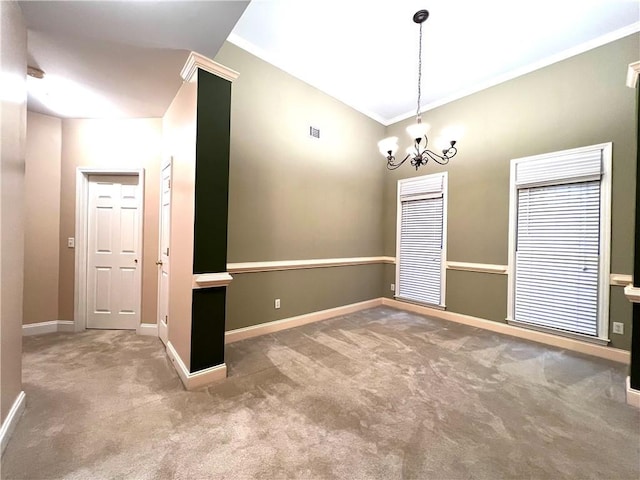 6745 Fairfield Trce, Suwanee, GA 30024 - spare room featuring a chandelier, carpet, baseboards, and crown molding