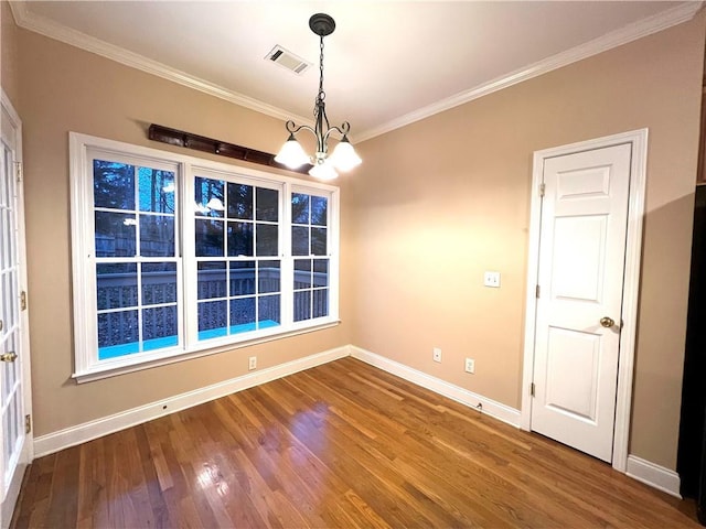6745 Fairfield Trce, Suwanee, GA 30024 - spare room with ornamental molding, a chandelier, baseboards, and wood finished floors