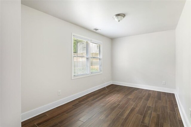 1258 Campbellton Rd SW, Atlanta, GA 30310 - unfurnished room with dark wood-type flooring and baseboards