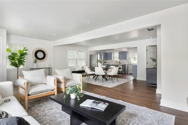 1258 Campbellton Rd SW, Atlanta, GA 30310 - living room featuring baseboards and wood finished floors