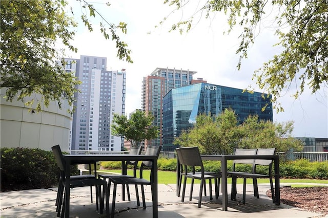 view of community with a patio