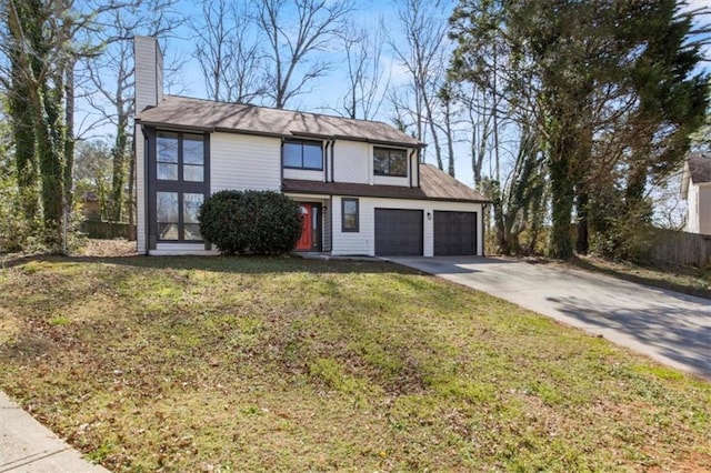 view of front of home with a chimney, concrete driveway, and a front yard