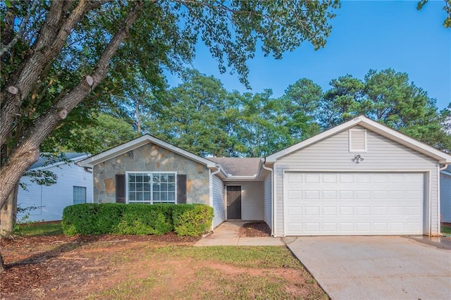 single story home featuring a garage