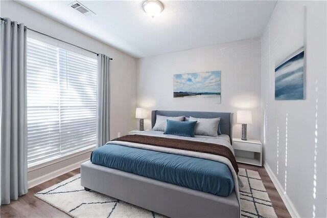 bedroom featuring hardwood / wood-style floors