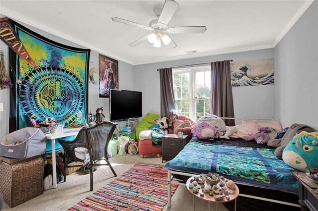 living room featuring ceiling fan, ornamental molding, and a fireplace