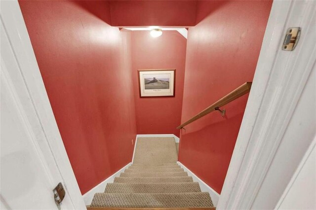 carpeted bedroom with ceiling fan and ornamental molding