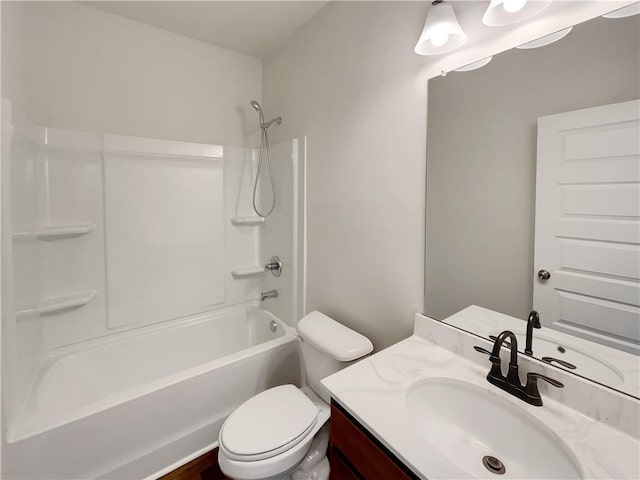 full bath featuring toilet, vanity, and shower / bathing tub combination