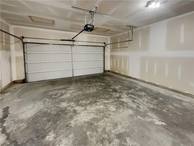 garage featuring a garage door opener