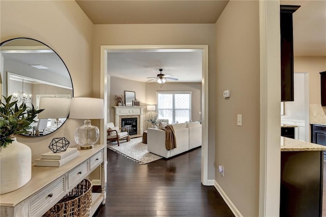 corridor featuring dark hardwood / wood-style flooring