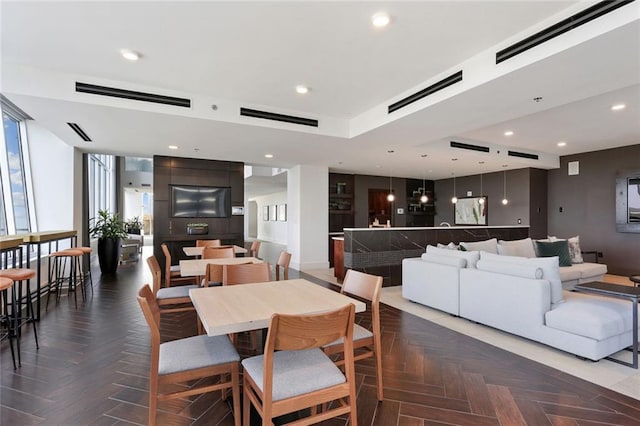 dining space with plenty of natural light and recessed lighting