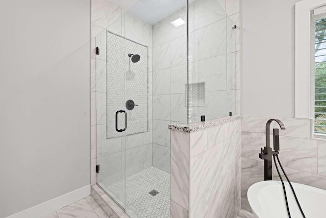 bathroom featuring tile walls and plus walk in shower