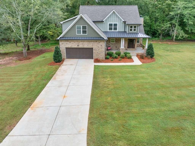 craftsman inspired home with a front lawn, a garage, and a porch