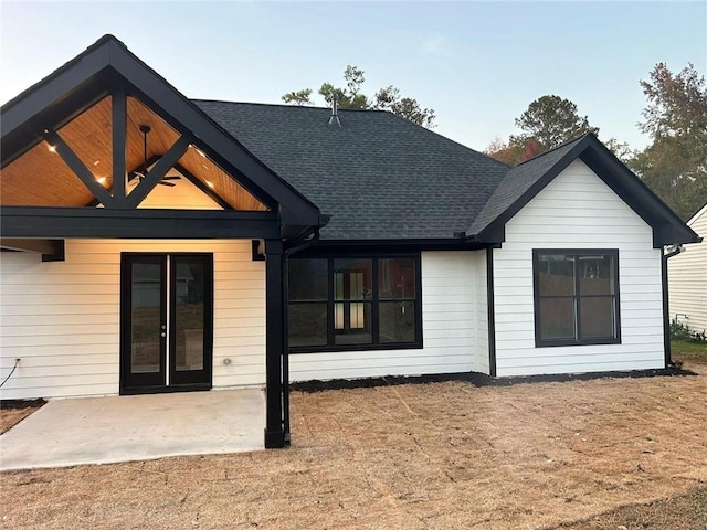 back of property featuring a patio