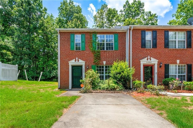 1382 Hollenbeck Ln, Riverdale, GA 30296 - view of front facade featuring a front lawn and brick siding