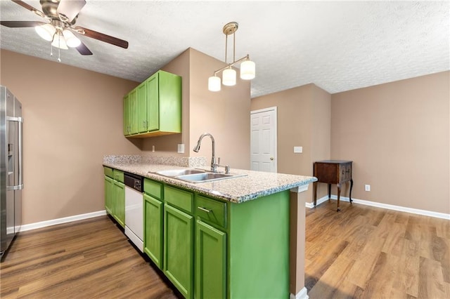 1382 Hollenbeck Ln, Riverdale, GA 30296 - kitchen featuring green cabinets, light wood-type flooring, a textured ceiling, and white dishwasher