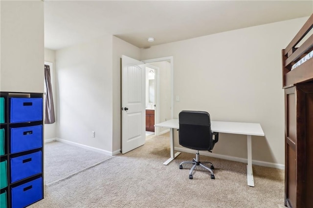 office with carpet floors and baseboards