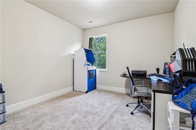 home office featuring visible vents, carpet, and baseboards