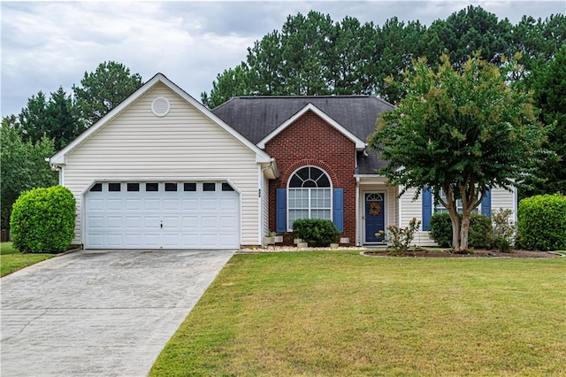 view of front of home featuring a garage and a front yard