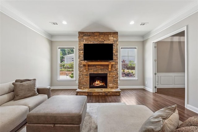 2040 Birchdale Dr, Milton, GA 30004 - living room featuring dark wood-style flooring, ornamental molding, a fireplace, baseboards, and recessed lighting