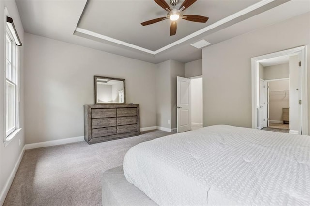 2040 Birchdale Dr, Milton, GA 30004 - carpeted bedroom featuring a raised ceiling, baseboards, and ceiling fan