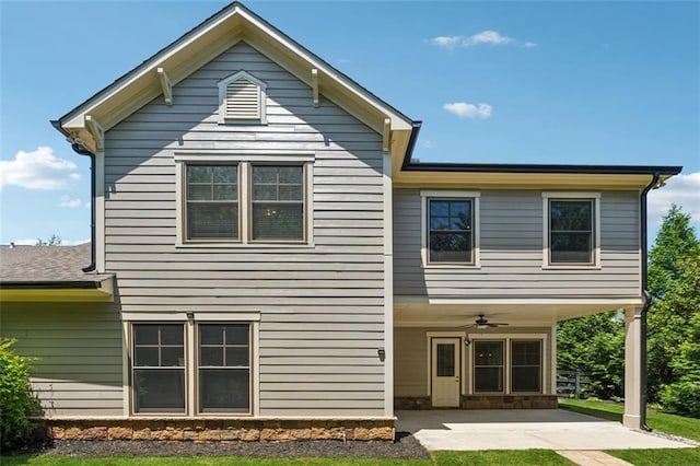 2040 Birchdale Dr, Milton, GA 30004 - rear view of property with ceiling fan, a patio, a lawn, and a carport
