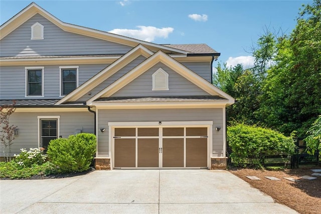 2040 Birchdale Dr, Milton, GA 30004 - craftsman house with driveway, a standing seam roof, metal roof, and a garage