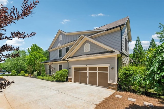2040 Birchdale Dr, Milton, GA 30004 - craftsman house with driveway and a garage
