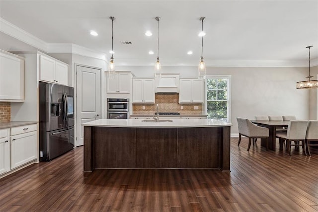 2040 Birchdale Dr, Milton, GA 30004 - kitchen with stainless steel appliances, backsplash, light countertops, white cabinetry, and crown molding