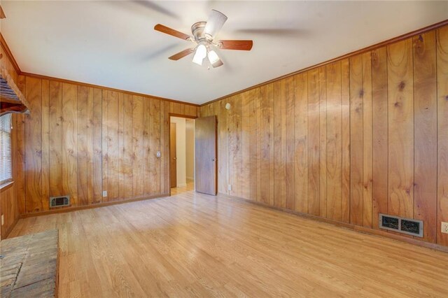 1830 Francis Rd SW, Conyers, GA 30094 - spare room featuring ceiling fan, wood finished floors, and wooden walls