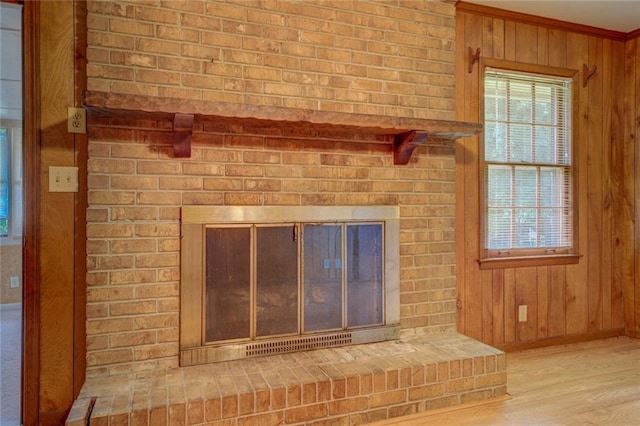 1830 Francis Rd SW, Conyers, GA 30094 - detailed view of wooden walls, wood finished floors, and a brick fireplace