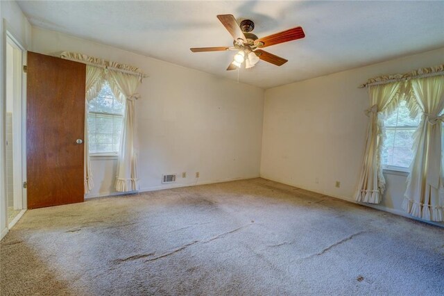 1830 Francis Rd SW, Conyers, GA 30094 - spare room featuring carpet floors and a ceiling fan