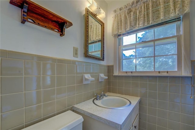 1830 Francis Rd SW, Conyers, GA 30094 - bathroom with tile walls, vanity, and wainscoting