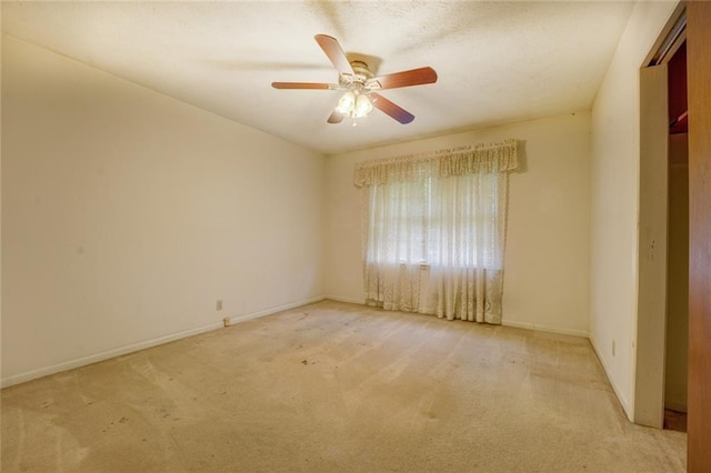 1830 Francis Rd SW, Conyers, GA 30094 - carpeted spare room with baseboards and a ceiling fan