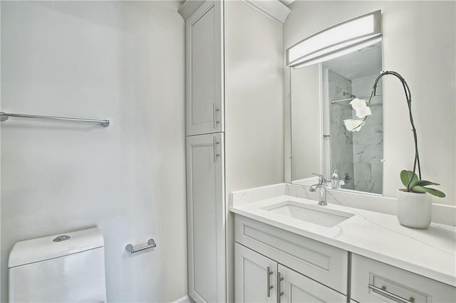 full bathroom with vanity, toilet, and walk in shower