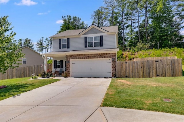 view of front property featuring a garage and a front yard