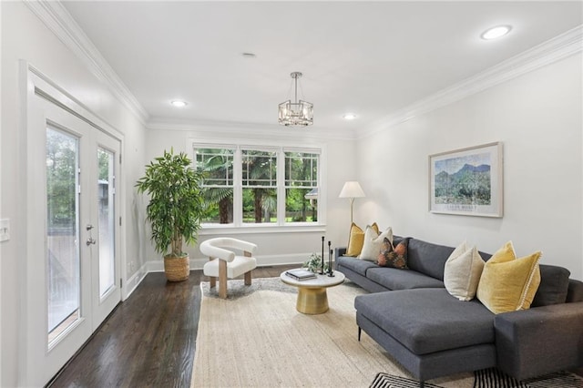 47 Oakridge Ave SE, Atlanta, GA 30317 - living area featuring a chandelier, dark wood finished floors, ornamental molding, and recessed lighting