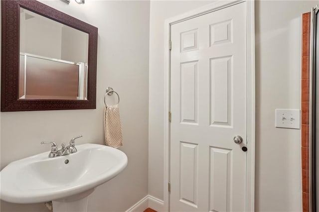47 Oakridge Ave SE, Atlanta, GA 30317 - full bath with a sink and baseboards