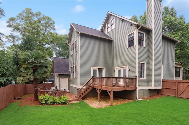 47 Oakridge Ave SE, Atlanta, GA 30317 - back of property with a deck, a chimney, a fenced backyard, and french doors
