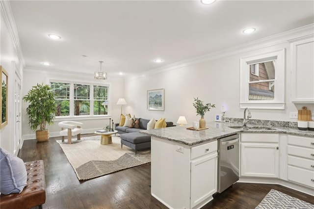 47 Oakridge Ave SE, Atlanta, GA 30317 - kitchen with stainless steel dishwasher, open floor plan, a peninsula, white cabinetry, and recessed lighting