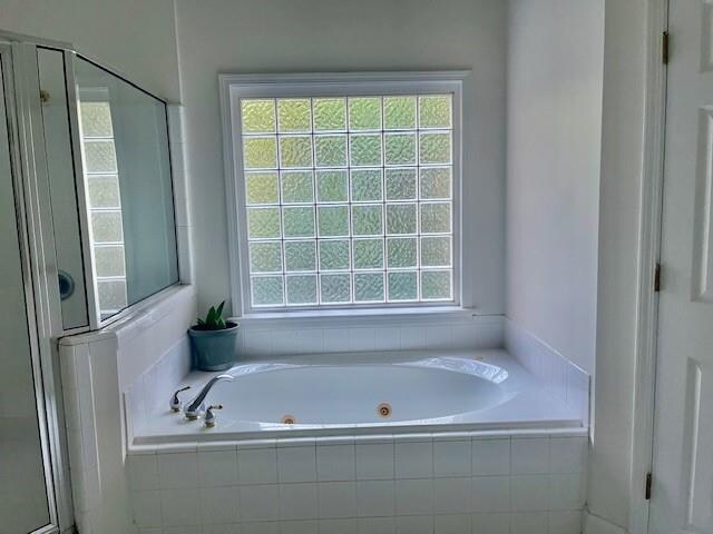 bathroom with tile patterned floors and vanity