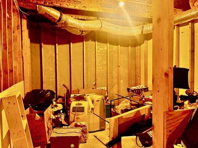 unfurnished room featuring a paneled ceiling and light tile patterned flooring