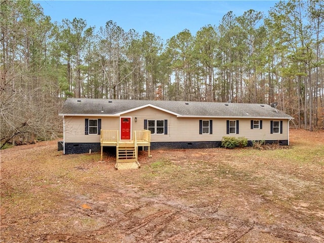 view of front of house featuring crawl space and a wooden deck