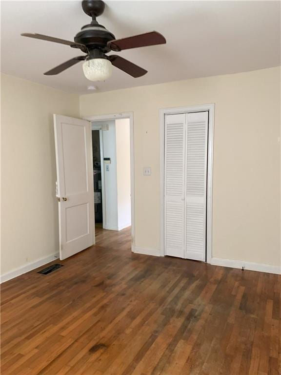 3604 Orchard Cir, Decatur, GA 30032 - unfurnished bedroom with wood finished floors, a closet, and a ceiling fan
