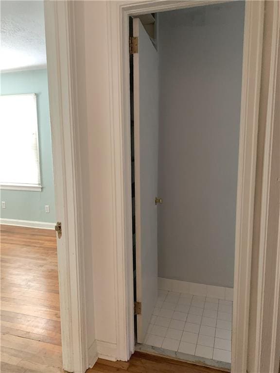 3604 Orchard Cir, Decatur, GA 30032 - bathroom featuring baseboards and wood finished floors