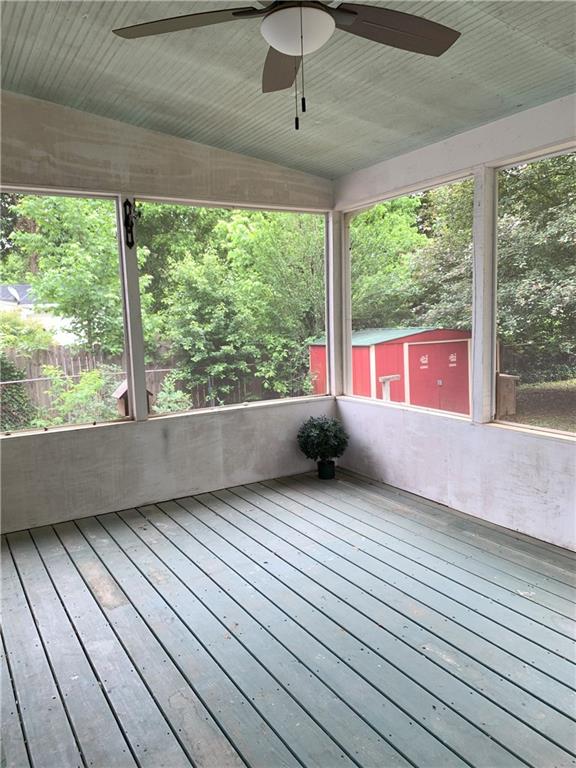 3604 Orchard Cir, Decatur, GA 30032 - unfurnished sunroom featuring a ceiling fan