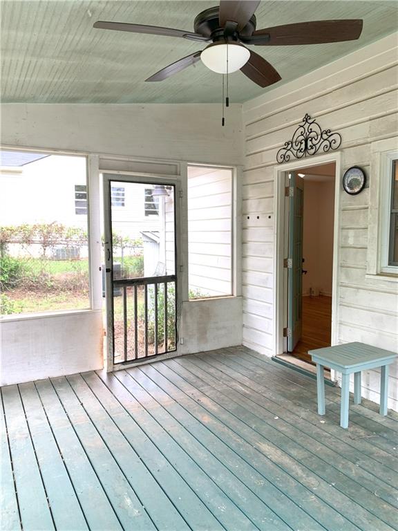 3604 Orchard Cir, Decatur, GA 30032 - unfurnished sunroom with a ceiling fan